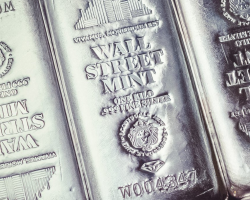 A close up of the back side of a silver bar.